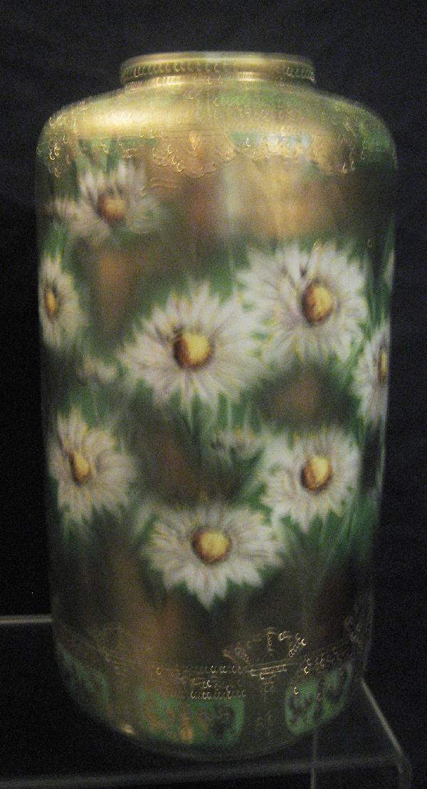Nippon Green maple leaf 12" cylinder vase: Nippon Green maple leaf 12" cylinder vase with white flowers and gold wash ground. Gold loss on rim.