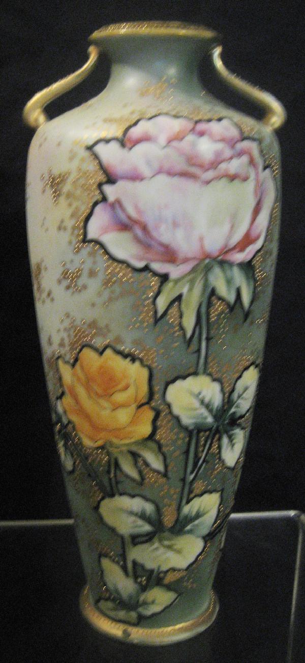 Nippon Green maple leaf 11" outlined rose vase: Nippon Green maple leaf 11" outlined rose decorated vase with scattered gold and enamel beaded decoration. Gold wear on handles.