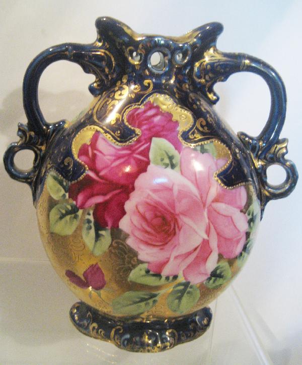 Unmarked Nippon 8" cobalt and rose decorated 2-ha: Unmarked Nippon 8" cobalt and rose decorated 2-handle vase with heavy gold background