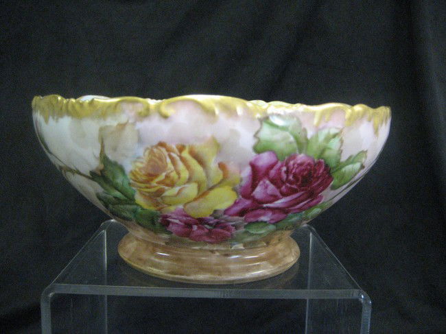 T&V Limoges 9 1/2" pedestal punch bowl with rose de: T&V Limoges 9 1/2" pedestal punch bowl with rose decoration signed F.C. Mortimer.