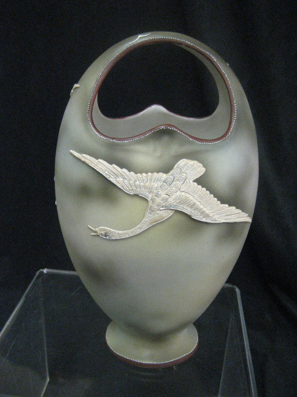 Unmarked Nippon 8 3/4" basket vase with moriage fl: Unmarked Nippon 8 3/4" basket vase with moriage flying swan decoration.
