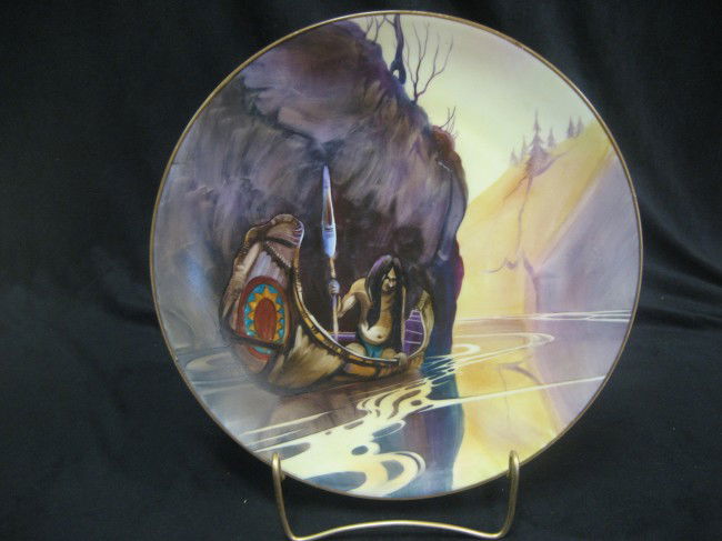 Nippon Green M with wreath 11" plaque with an Indi: Nippon Green M with wreath 11" plaque with an Indian in a canoe spear fishing. "In the Crystal Depths".
