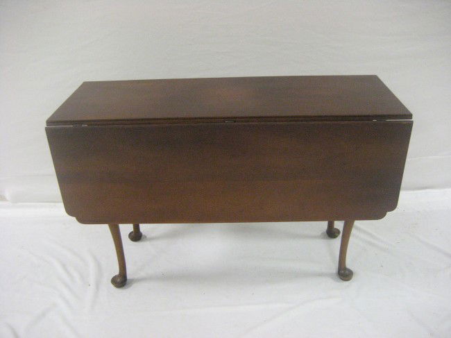 Early maple Queen Ann drop leaf gate leg table wit: Early maple Queen Ann drop leaf gate leg table with solid board top. 28" tall, 44 1/2" long, 16 1/4" wide.