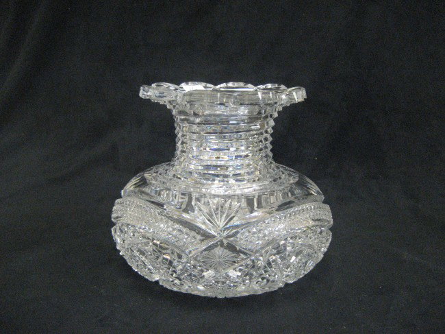 Squat 6" cut glass bulbous centerpiece vase. Mino: Squat 6" cut glass bulbous centerpiece vase. Minor nicks.