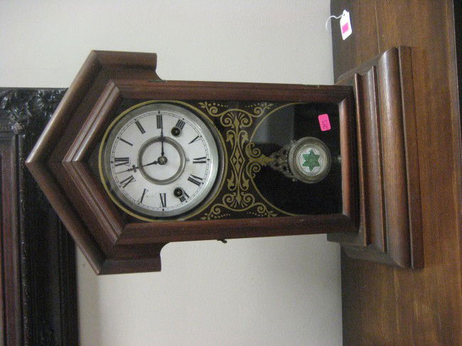 Seth Thomas walnut mantle clock.: Seth Thomas walnut mantle clock. 17 1/2" tall, 10 1/2" wide, 5" deep.