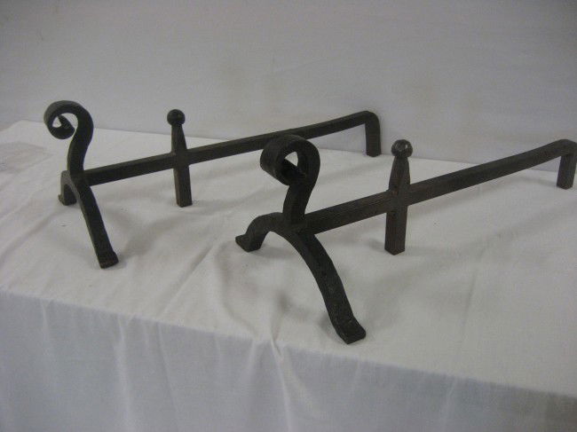 Set of early forged andirons. 9 3/4" tall, 28 3/4: Set of early forged andirons. 9 3/4" tall, 28 3/4" long.