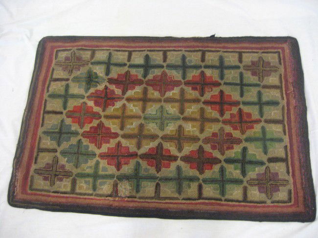 Early rug with colorful block design with crosses.: Early rug with colorful block design with crosses. 4' 1 1/2" X 2' 9 1/4"