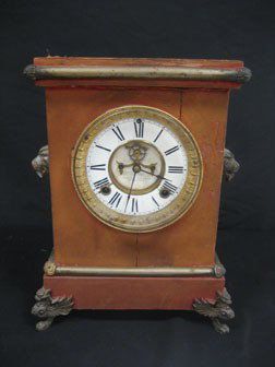 Ansonia red cloth mantle clock with winged Griffin: Ansonia red cloth mantle clock with winged Griffin feet. Lots of cloth wear, cracking on porcelain face.
