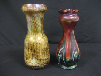 Irridescent 10 3/8" vase with caramel interior (1/: Irridescent 10 3/8" vase with caramel interior (1/2" line crack at top), and 9 1/2" art glass vase with pulled exterior design (chip on base)