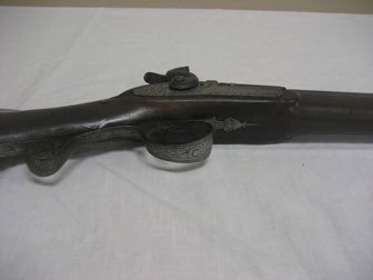 Early English Fowler marked London on barrel. Eng: Early English Fowler marked London on barrel. Engraved W. Ketland & Co. lock, with engraved dolphin hammers, walnut stock with silver escutcheon plate and gold bands.