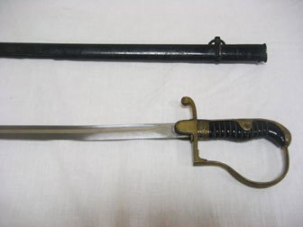 Herm Rath WWII Army sword with engraved eagle on l: Herm Rath WWII Army sword with engraved eagle on lancet. Original leather buffer in place, 38" overall.