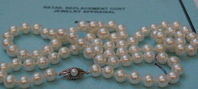32" strand of Mikimoto pearls. : 32" strand of Mikimoto pearls.
