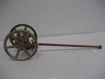 Gong bell pull toy with horses on center wheel.: Gong bell pull toy with horses on center wheel.