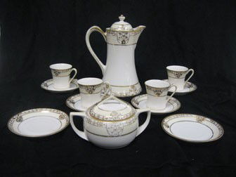 Nippon Green M with wreath gold decorated chocolat: Nippon Green M with wreath gold decorated chocolate set with 4 cups, 6 saucers, and covered sugar bowl.