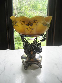 Victorian centerpiece with Pairpoint frame and butt: Victorian centerpiece with Pairpoint frame and butterscotch swirled satin gold and enamel decorated 9 1/2" ruffle edge bowl.