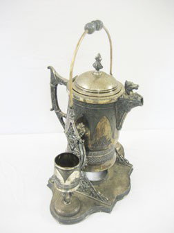 Simpson Hall Miller & Co. silver plate tilting pitc: Simpson Hall Miller & Co. silver plate tilting pitcher and two goblets. Marked "Treble Plate".