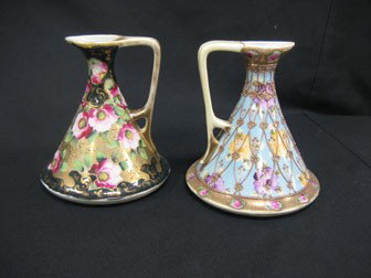 7" unmarked Nippon ewers: one with blue background : 7" unmarked Nippon ewers: one with blue background and heavy gold floral and vine decoration. Some loss and heavy gold wear; The other with deep green background with floral decoration. Gold wear on h