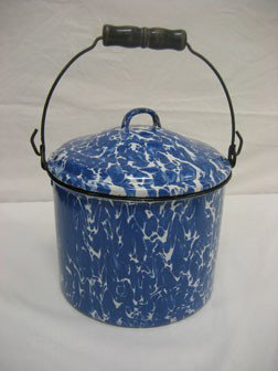 Graniteware: Blue & white swirl 8" seamless covere: Graniteware: Blue & white swirl 8" seamless covered bucket with dome lid, wire bail, black trim and lid with interior blue & white swirl enameling. Minor loss/blow out on body, minor loss on bottom.