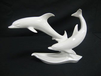 Kaiser Porcelain Dolphins. 8" tall, app. 11" wide: Kaiser Porcelain Dolphins. 8" tall, app. 11" wide. G. Bochmann.