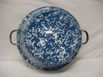 Graniteware: Blue & white swirl 16 1/4" round han: Graniteware: Blue & white swirl 16 1/4" round handled dish pan with black rim and handles. Seamless, with minor loss.