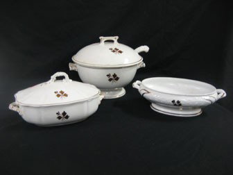 Tea Leaf ironstone: Anthony Shaw Burslem open veg: Tea Leaf ironstone: Anthony Shaw Burslem open vegetable with embossed flroal decoration - 12 1/4" wide at handles; Alfred Meakin covered vegetable - staining and crazing on bottom and interior, line c