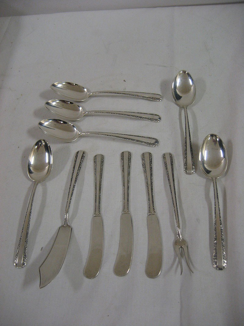 Towle Candlelight sterling silver: (6) teaspoons: Towle Candlelight sterling silver: (6) teaspoons, (3) butter spreaders, olive fork, odd knife.