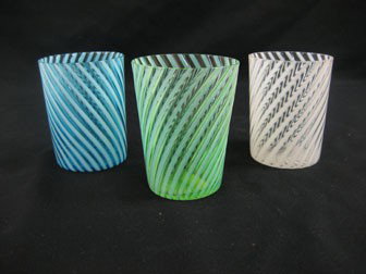 Swirl ribbed opalescent tumblers. Blue, green and: Swirl ribbed opalescent tumblers. Blue, green and white. Minor nicks on white. Green in 3 7/8".