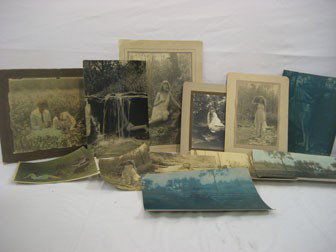 Collection of photographs by Mabel Britt, Norwood,: Collection of photographs by Mabel Britt, Norwood, Ohio, and a member of the Cincinnati Camera Club: Edna Britt by a stream with pottery; tinted photo with a split rail fence and log cabin; Edna Britt