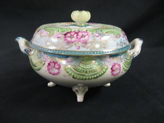 Unmarked Nippon covered two-handle dish with flora: Unmarked Nippon covered two-handle dish with floral and beaded enamel decoration.