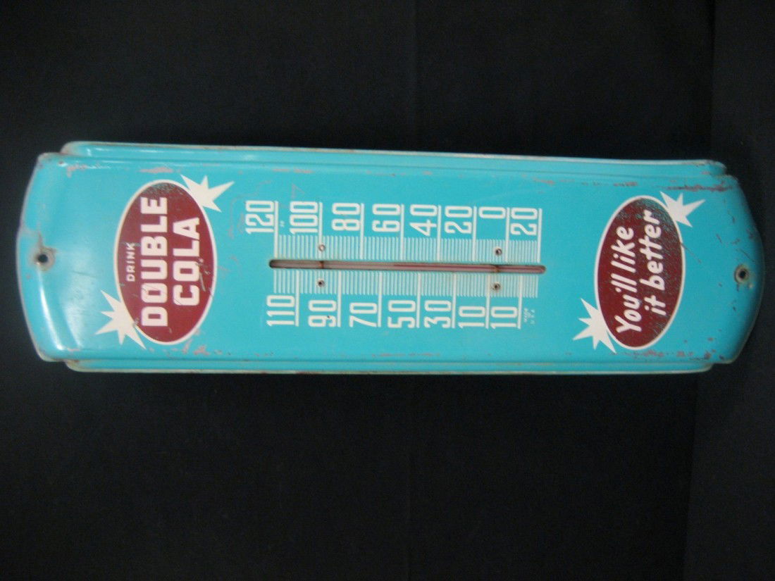 Dringk Double Cola You'll Like It thermometer, app: Dringk Double Cola You'll Like It thermometer, app. 5" X 17". Some edge loss, flaking at bottom right, some scratching, minor denting.