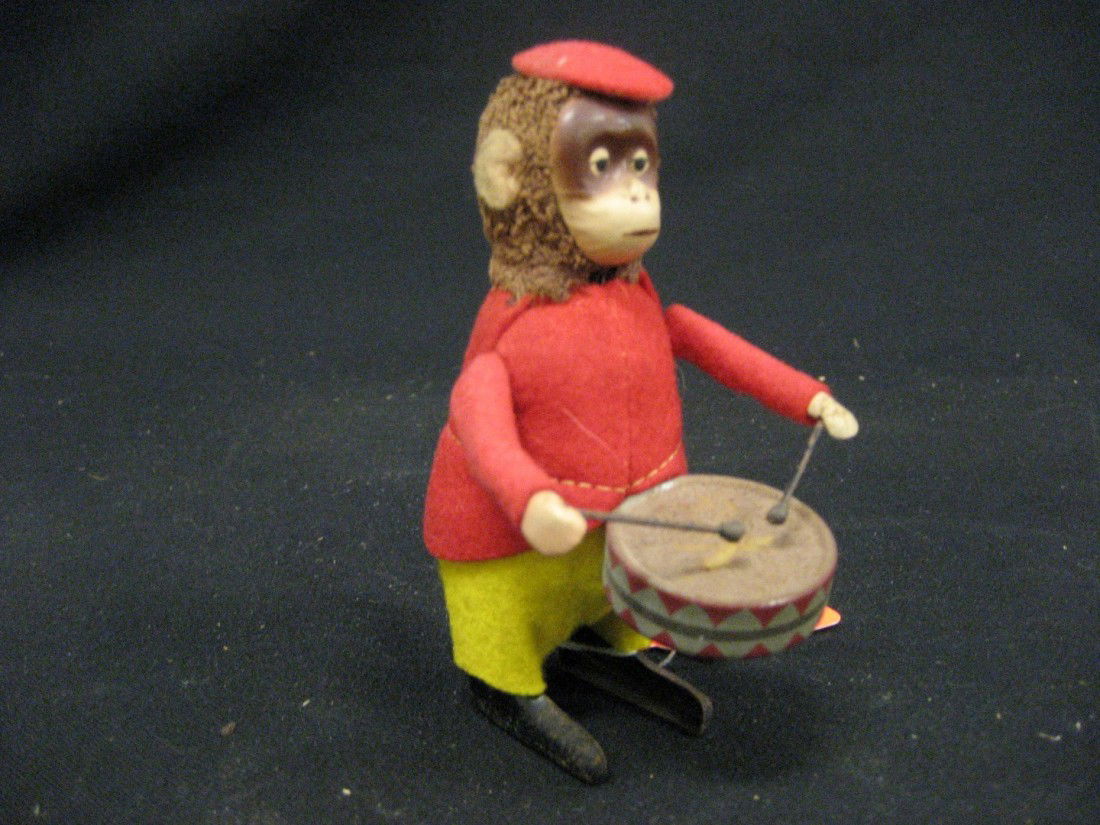 Schuco Monkey drummer, litho tin with cloth outfit: Schuco Monkey drummer, litho tin with cloth outfit, 4 1/2"