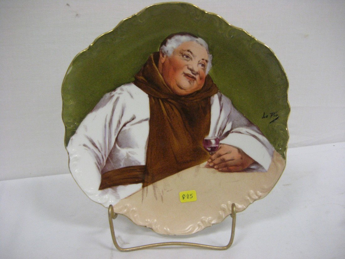Limoges Coronet 9 7/8" charger signed Le Pie. Min: Limoges Coronet 9 7/8" charger signed Le Pie. Minor under glazing on front.