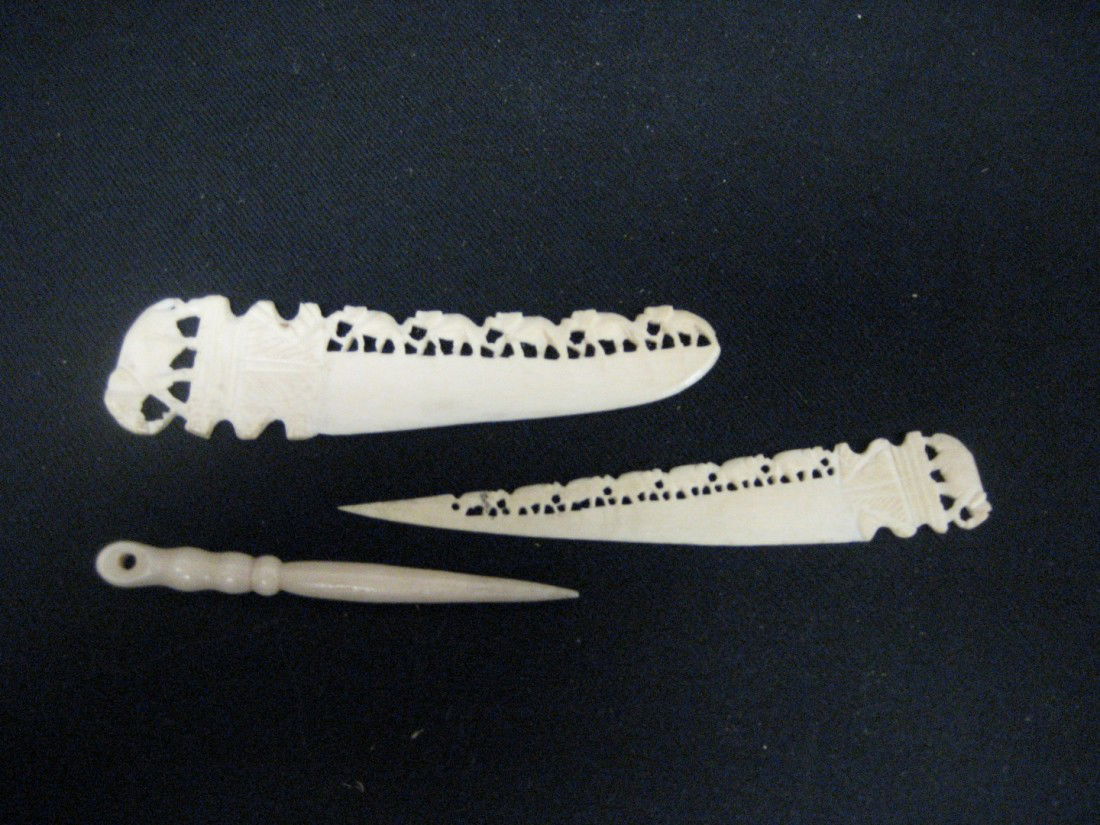 Carved ivory: 3 3/4" letter opener with elephant: Carved ivory: 3 3/4" letter opener with elephant top and 5 elephant chain; 2 3/4" hair pin; 3 15/16" letter opener with elephant top and 7 elephant chain.