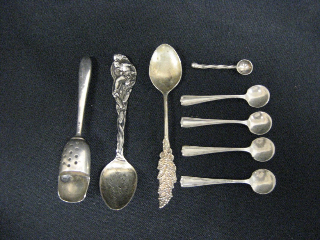 Sterling silver: scoop, spoon with corn and India: Sterling silver: scoop, spoon with corn and Indian with Montie Sue engraved in bowl, spoon, (4) salt spoons, and unmarked twist handle scoop.