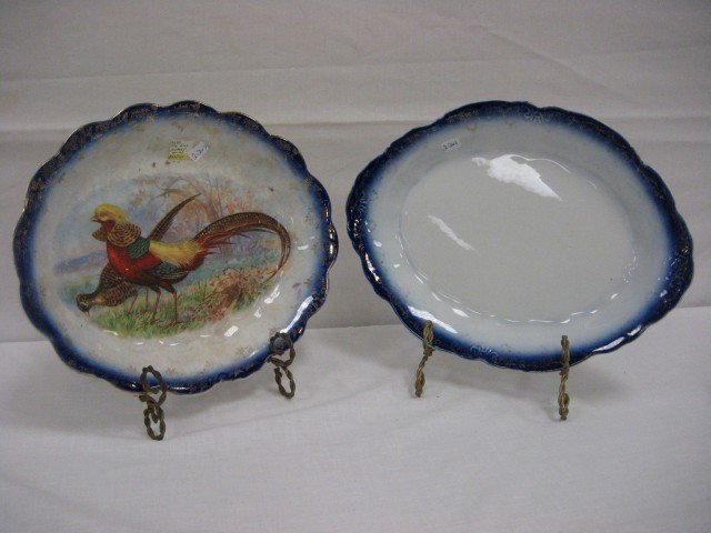 Two (2) flow blue platters. HR Wyllie China 13 1/: Two (2) flow blue platters. HR Wyllie China 13 1/4" platter with gold trim - some loss on trim; and 12 5/813 1/4" Royal Kinran Nippon charger with beaded gold and floral decoration platter with Chines