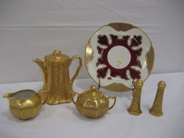 10 1/2" Royal Bavarian Austria charger with gold b: 10 1/2" Royal Bavarian Austria charger with gold border - minor back flake, and Wheeling Dec. Co. gold decorated tea set and shakers. Minor base nick on tea pot - Ransom, cream and sugar marked Bavari
