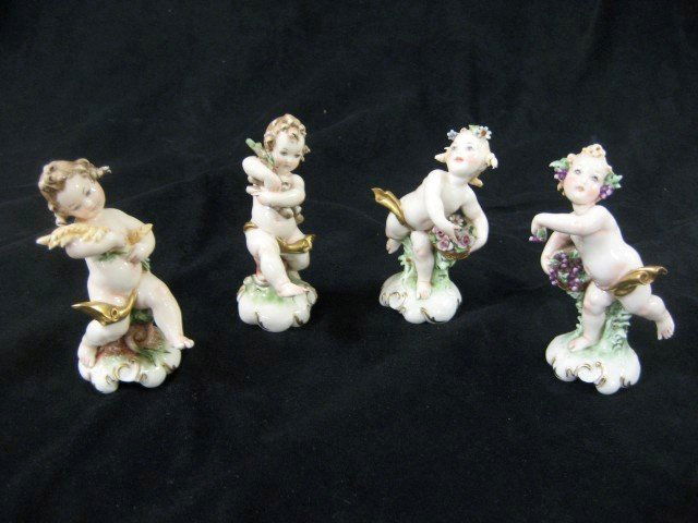 (4) Crown Neopolitan cherub figures celebrating th: (4) Crown Neopolitan cherub figures celebrating the harvest, 3 3/4", minor loss