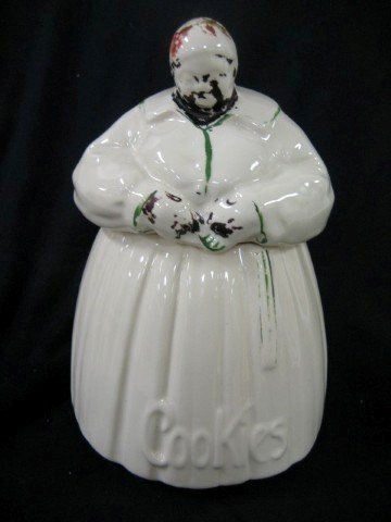 McCoy Mammy "Cookies" jar, 11" tall, paint loss.: McCoy Mammy "Cookies" jar, 11" tall, paint loss.