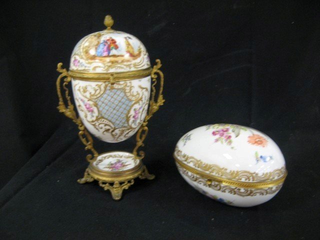 French Old Paris style 7 1/2" porcelain egg with S: French Old Paris style 7 1/2" porcelain egg with Sevres floral decoration and dore mounts, marked Porcelaine De Paris Made in France, with an 11" mounted acorn form hinged box with courting scene and 