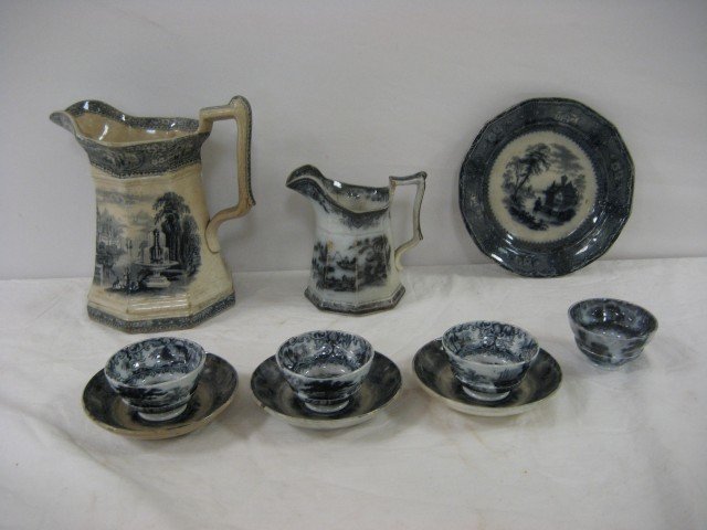 Ironstone: Foliage handleless pedestal cups (4), : Ironstone: Foliage handleless pedestal cups (4), 1 5/8" tall; Foliage black transfer 4 1/2" saucer with stains and chips; 7 1/2" Clementson Tillenberg flow black plate with crazing and back base chip;