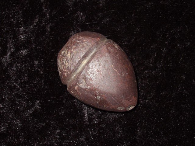 Very fine 1 5/8" polished Hematite plummet found b: Very fine 1 5/8" polished Hematite plummet found by R. Walker at the Parr Farm in Adams Co., OH in May, 1994