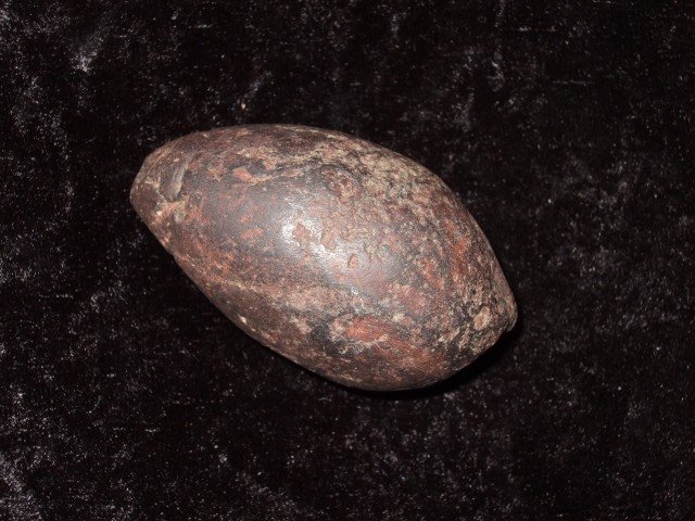 2 1/8" Hematite tear drop plummet found by R. Walk: 2 1/8" Hematite tear drop plummet found by R. Walker on Mr. Cunningham's Farm on Rt. 52 in Scioto Co., OH on 12-31-87