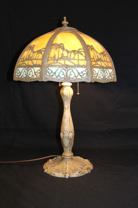 8-panel slag lamp with desert scene. Rewired and w: 8-panel slag lamp with desert scene. Rewired and working. Paint loss on base and shade frame, app. 24" tall, shade is 16" wide.