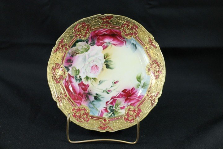 Green maple leaf Nippon 8 5/8" rose decorated plat: Green maple leaf Nippon 8 5/8" rose decorated plate with heavy gold decorated border, minor wear