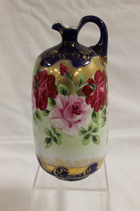 Unmarked Nippon 9 3/4" cobalt and gold decorated e: Unmarked Nippon 9 3/4" cobalt and gold decorated ewer with rose decorated body, minor gold wear