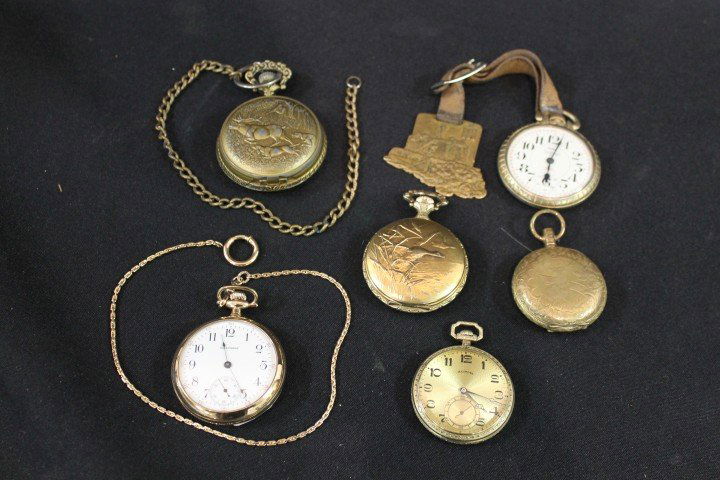Group of Pocket watches: westclox 2 1/8" with hun: Group of Pocket watches: westclox 2 1/8" with hunt scene case; Waltham 25 with International Harvester dozer fob; Ever Swiss screwback 17 jewel with hunt scene case; closed face with hunt scene case #