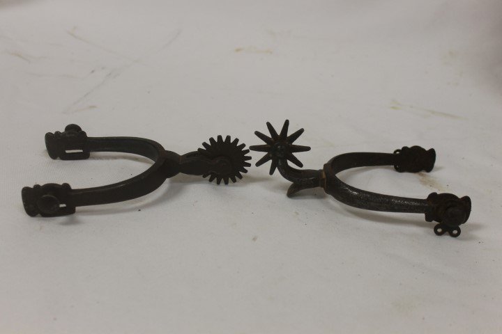 Two mismatched spurs.: Two mismatched spurs.