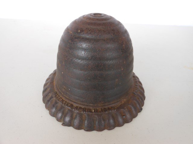 Cast iron beehive string holder with Aug. 21, 1858: Cast iron beehive string holder with Aug. 21, 1858 patent date, 4 1/2" tall, 6 1/2' wide