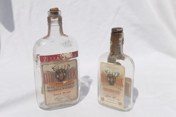 Old Elk Brand Kentucky Straight Bourbon Whiskey, pint,: Old Elk Brand Kentucky Straight Bourbon Whiskey, pint, some loss on label, partial tax stamp, back label with loss; Old Elk Whiskey half pint, Lexington, KY, partial tax stamp, Made inKY button label,