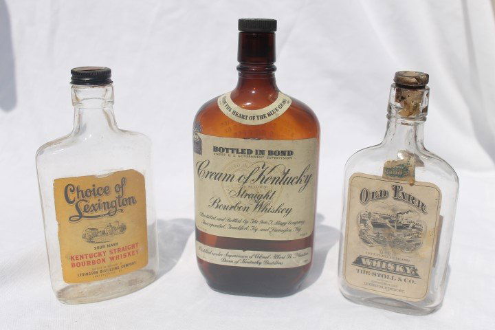 Whiskey bottles: Choice of Lexington, KY Straight: Whiskey bottles: Choice of Lexington, KY Straight Bourbon Whisky - Lexington Distillery Co. Lawrenceburg, KY, half pint, partial tax stamp, partial back label; Cream of Kentucky Straight Bourbon Whisk